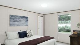 The THRILL Guest Bedroom. This Manufactured Mobile Home features 3 bedrooms and 2 baths.