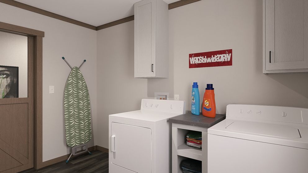 The EVERETT ELITE Utility Room. This Manufactured Mobile Home features 4 bedrooms and 3 baths.