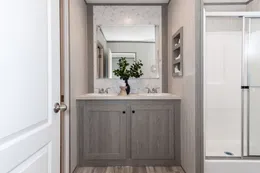 The BLAZER 76 F Primary Bathroom. This Manufactured Mobile Home features 3 bedrooms and 2 baths.