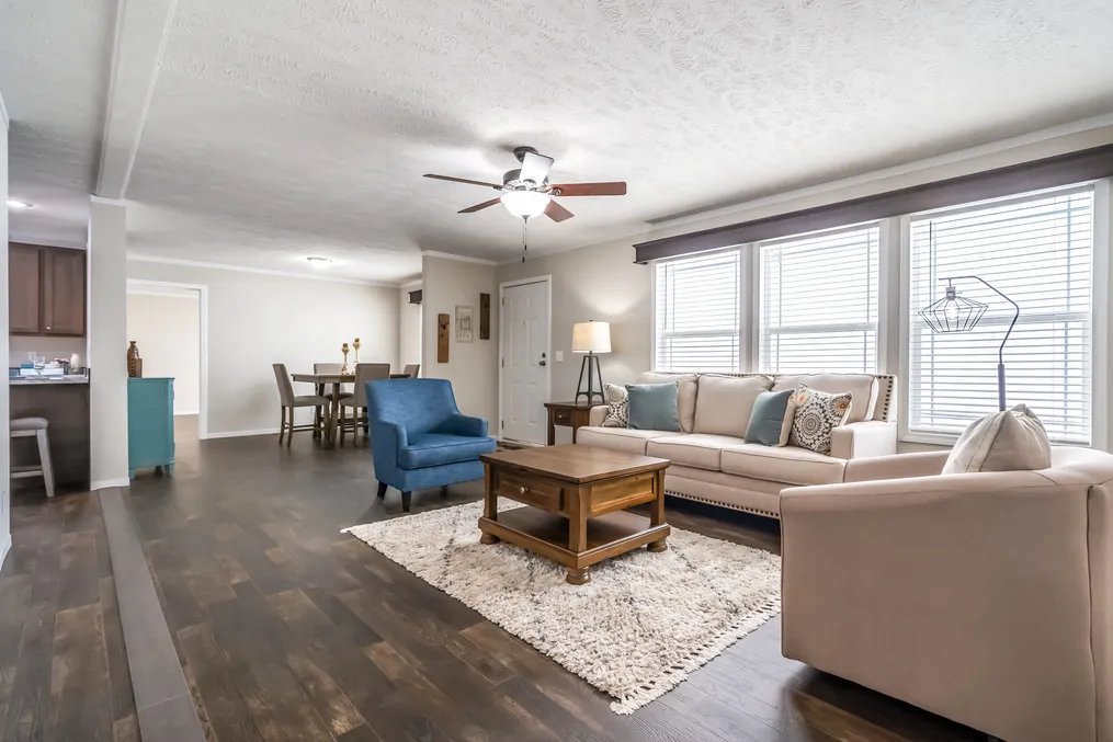 The MAVERICK 56A Living Room. This Manufactured Mobile Home features 3 bedrooms and 2 baths.
