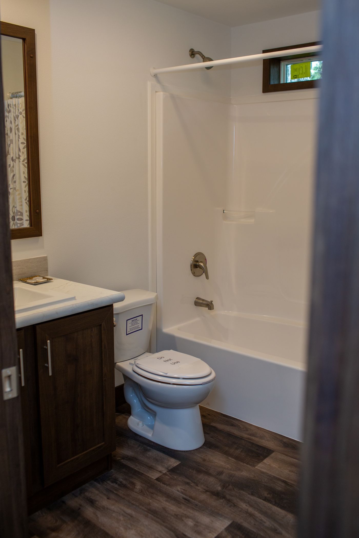 The RAMSEY 75 MOD Guest Bathroom. This Modular Home features 4 bedrooms and 2 baths.