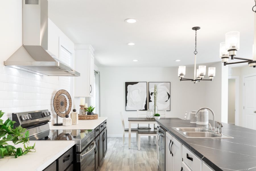The BUTLER PLACE/6428-MS056 SECT Kitchen. This Manufactured Mobile Home features 3 bedrooms and 3 baths.