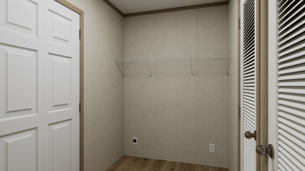 The 5624-CC56 GUARDIAN 56 Utility Room. This Manufactured Mobile Home features 3 bedrooms and 2 baths.