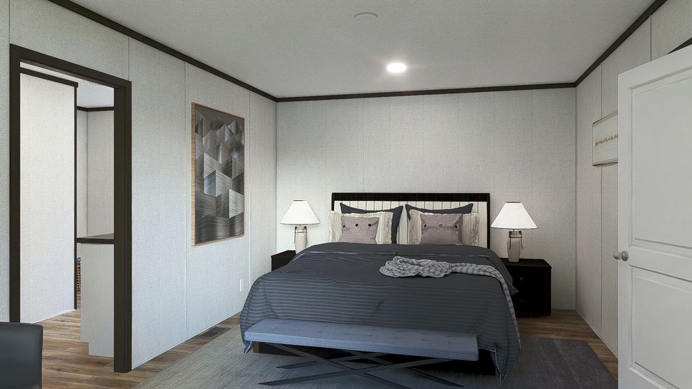 The GRAND Primary Bedroom. This Manufactured Mobile Home features 3 bedrooms and 2 baths.