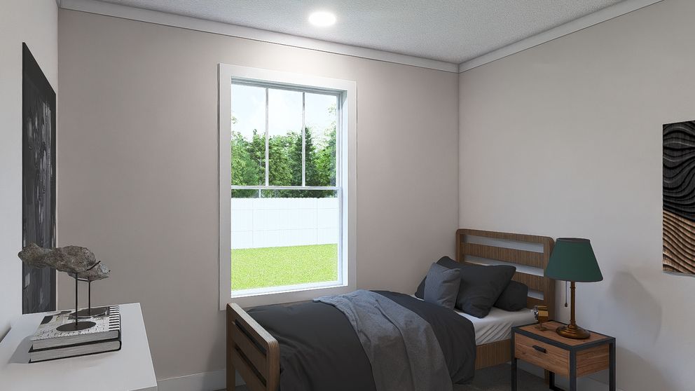 The WHOLE LOTTA LOVE Guest Bedroom. This Manufactured Mobile Home features 3 bedrooms and 2 baths.