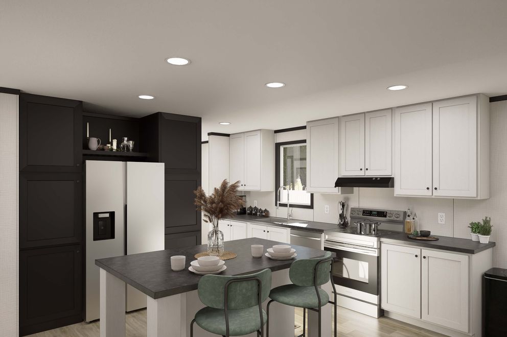 The PLATINUM ANNIVERSARY Kitchen. This Manufactured Mobile Home features 3 bedrooms and 2 baths.