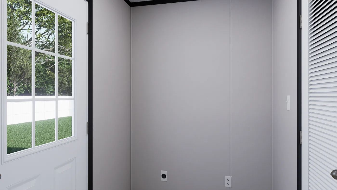The THE MOUNTAINEER 56 Utility Room. This Manufactured Mobile Home features 3 bedrooms and 2 baths.