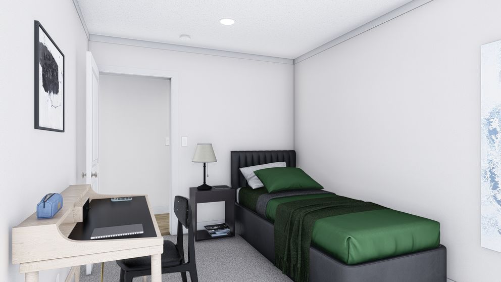 The JOHNNY B GOODE Bedroom. This Manufactured Mobile Home features 3 bedrooms and 2 baths.