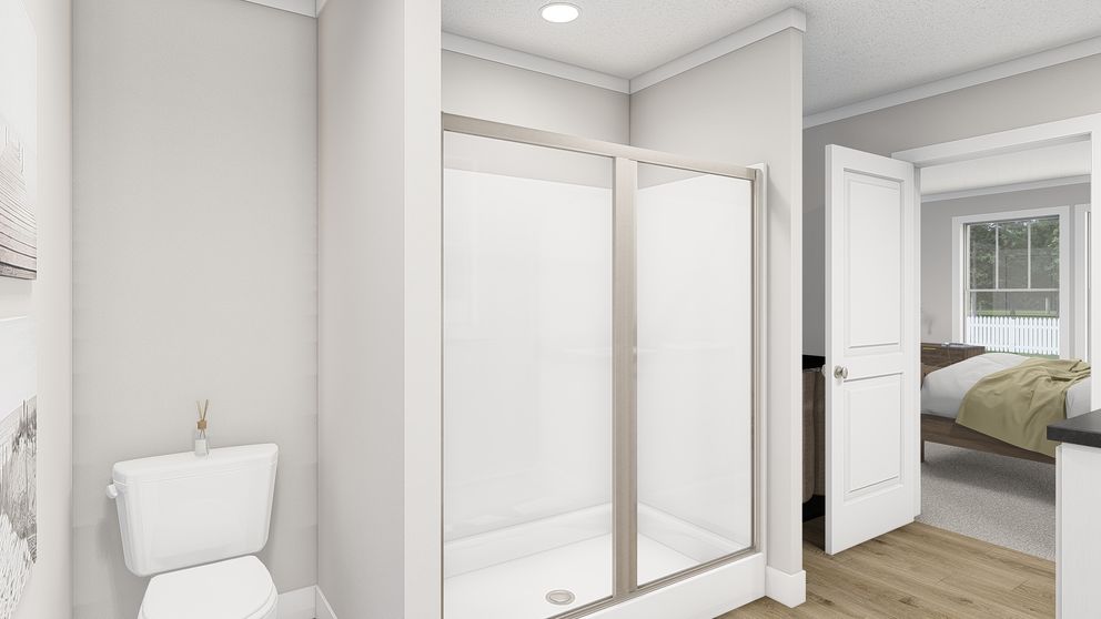 The BROWN EYED GIRL Primary Bathroom. This Manufactured Mobile Home features 4 bedrooms and 2 baths.