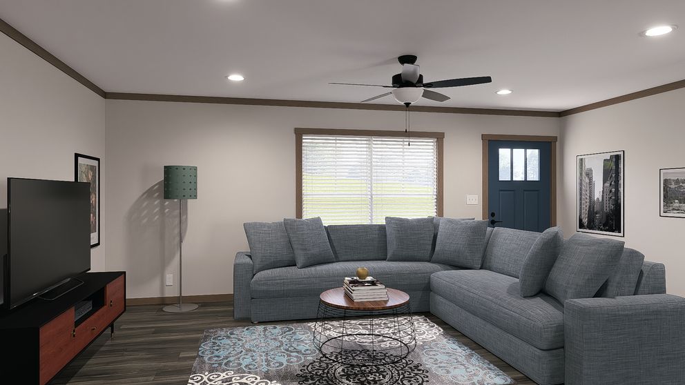 The NELLIE Living Room. This Manufactured Mobile Home features 4 bedrooms and 2 baths.