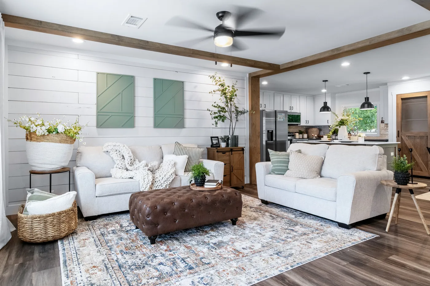 The SAWYER ELITE Living Room. This Manufactured Mobile Home features 3 bedrooms and 2 baths.