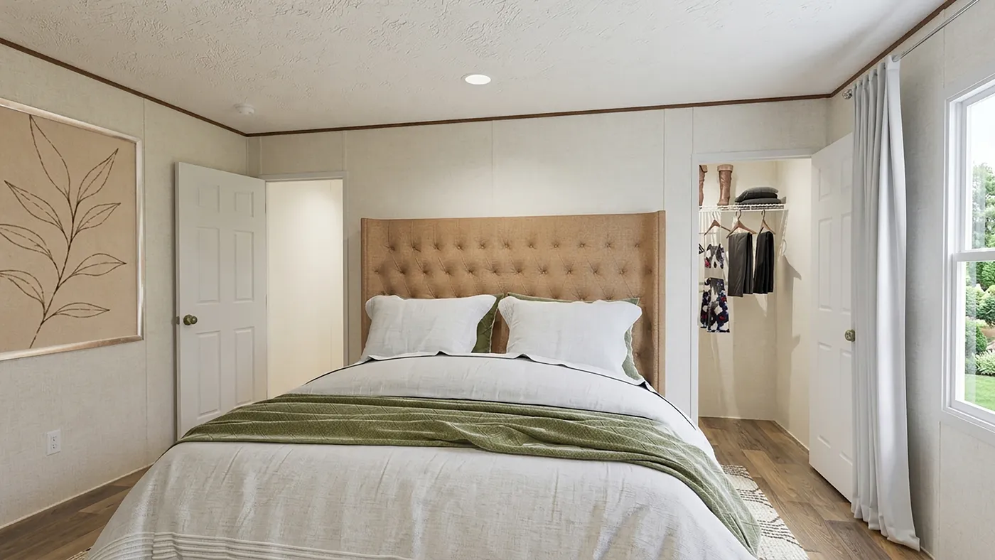 The ASPEN Primary Bedroom. This Manufactured Mobile Home features 3 bedrooms and 2 baths.
