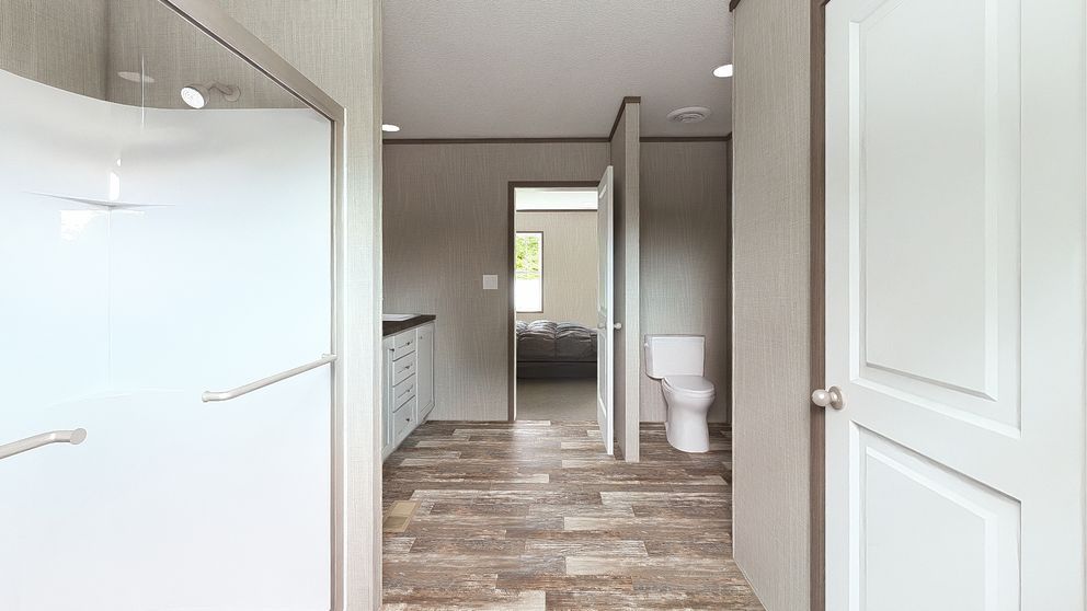 The ULTRA BREEZE 28X52 Primary Bathroom. This Manufactured Mobile Home features 3 bedrooms and 2 baths.