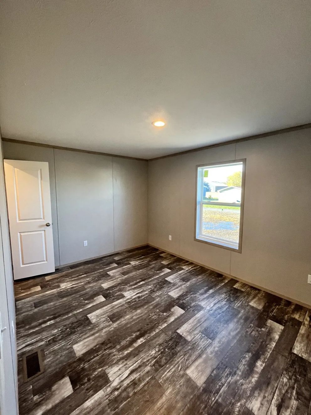 The SAPPHIRE Guest Bedroom. This Manufactured Mobile Home features 3 bedrooms and 2 baths.