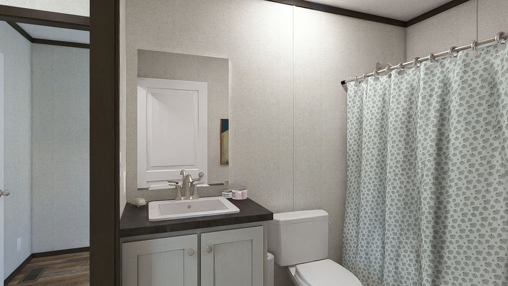 The FESTIVAL Guest Bathroom. This Manufactured Mobile Home features 3 bedrooms and 2 baths.