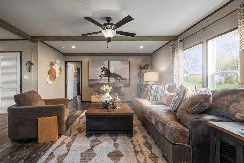 The THE TRIBUTARY Exterior. This Manufactured Mobile Home features 3 bedrooms and 2 baths.