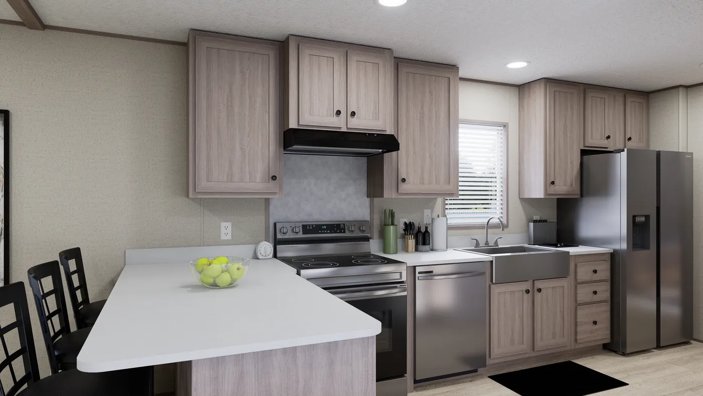 The THE ANNIVERSARY 76 Kitchen. This Manufactured Mobile Home features 3 bedrooms and 2 baths.