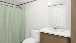 The BLISS Primary Bathroom. This Manufactured Mobile Home features 2 bedrooms and 1 bath.
