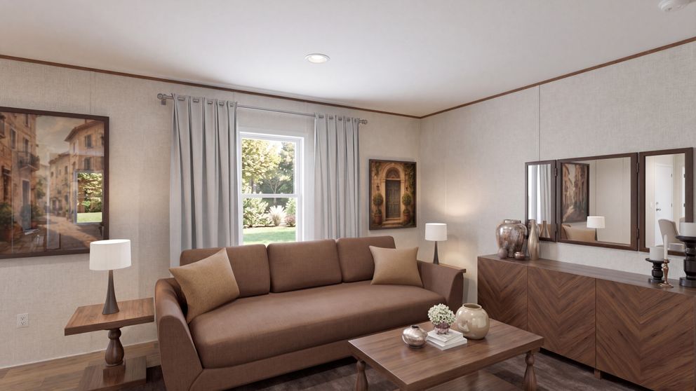 The CYPRESS Living Room. This Manufactured Mobile Home features 4 bedrooms and 2 baths.