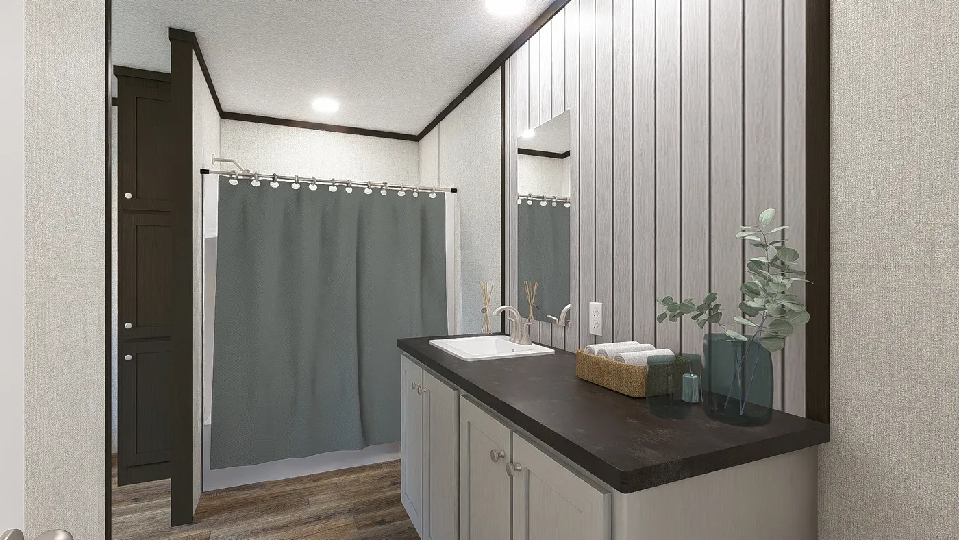 The REVEAL Primary Bathroom. This Manufactured Mobile Home features 3 bedrooms and 2 baths.
