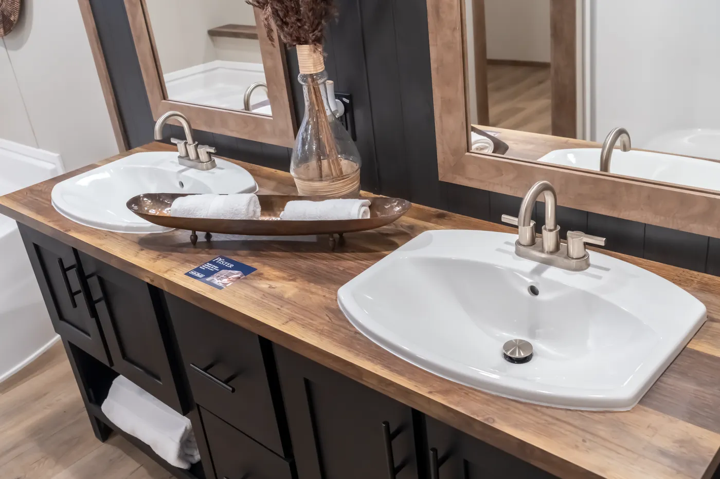 The SEVIER Primary Bathroom. This Manufactured Mobile Home features 4 bedrooms and 3 baths.