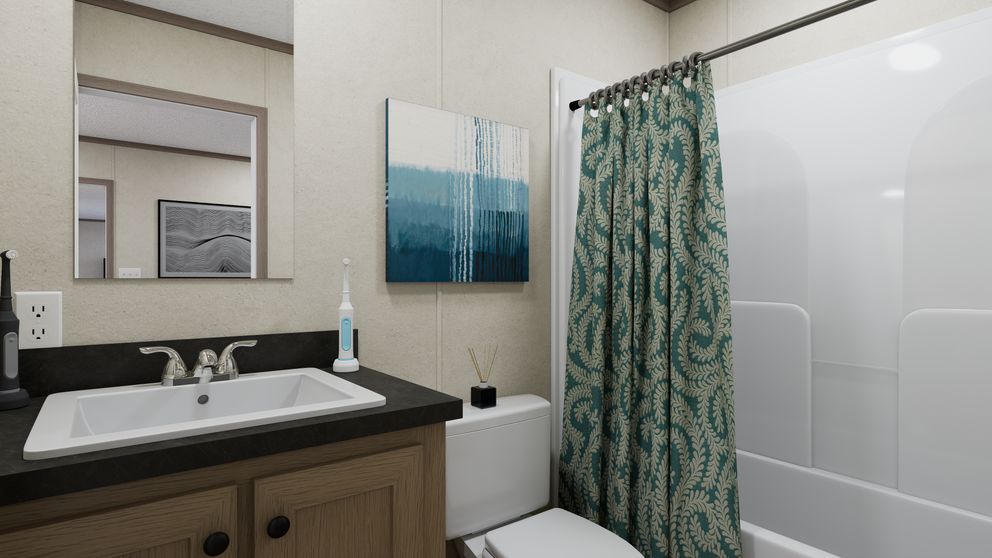 The 5614-CC02 CLEARPATH 56 Primary Bathroom. This Manufactured Mobile Home features 2 bedrooms and 2 baths.