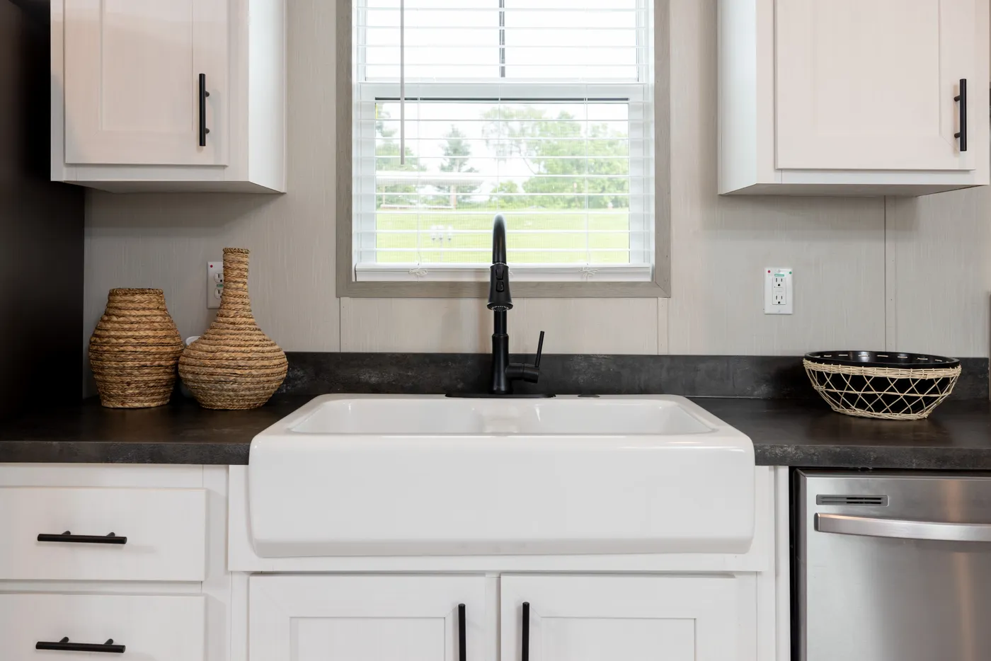 The SHOWER HOUSE Kitchen. This Manufactured Mobile Home features 3 bedrooms and 2 baths.