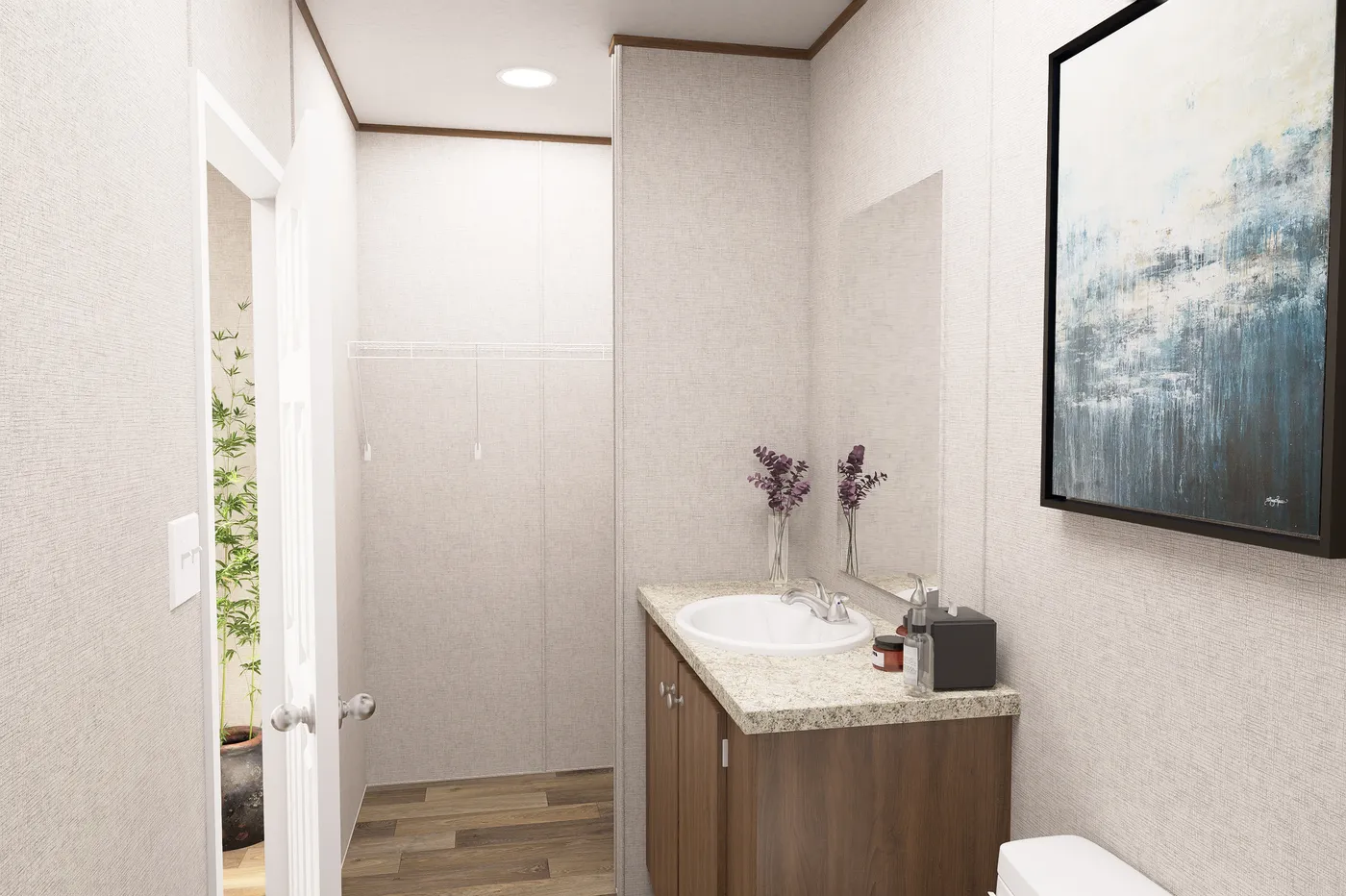 The HICKORY Primary Bathroom. This Manufactured Mobile Home features 3 bedrooms and 2 baths.