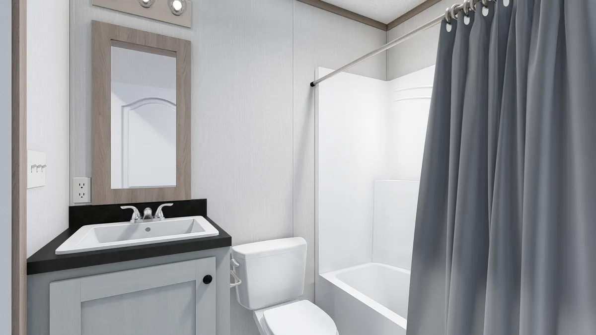 The 4824-E734 THE PULSE Guest Bathroom. This Manufactured Mobile Home features 3 bedrooms and 2 baths.
