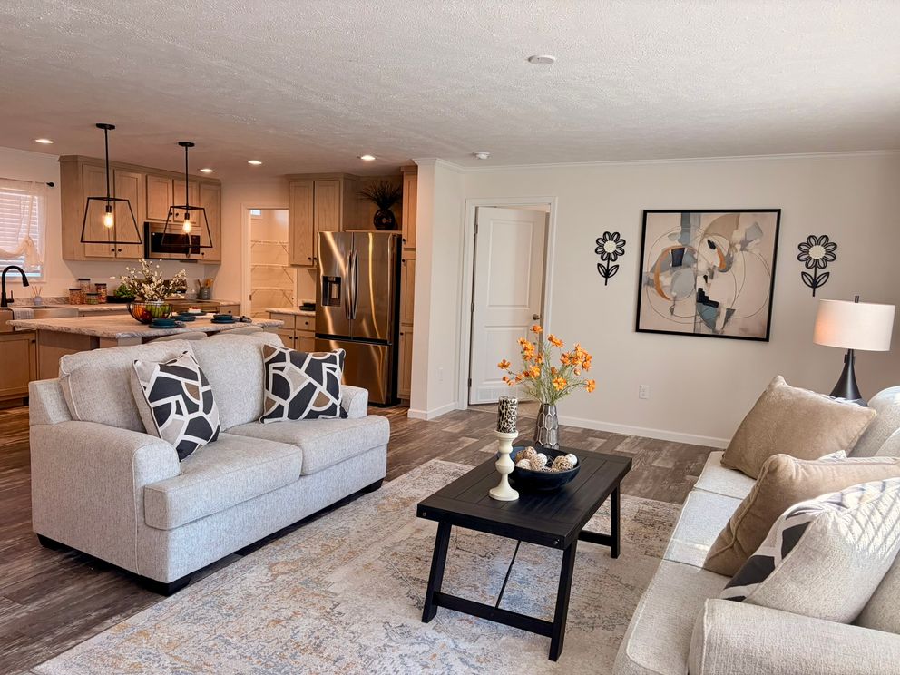 The TOURMALINE 7628-649 Living Room. This Manufactured Mobile Home features 4 bedrooms and 2 baths.