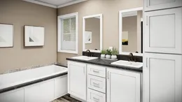 The THE MAVERICK Primary Bathroom. This Manufactured Mobile Home features 3 bedrooms and 2 baths.