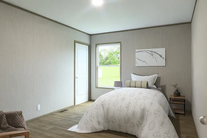 The EVEREST Guest Bedroom. This Manufactured Mobile Home features 4 bedrooms and 2 baths.
