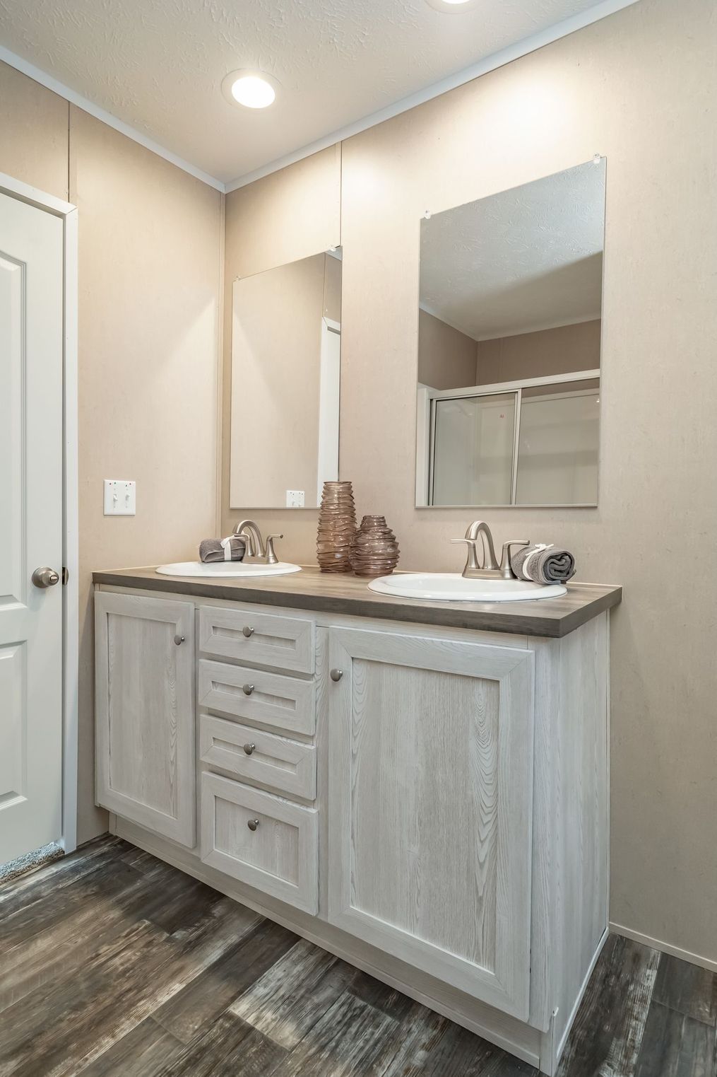 The ULTRA EXCEL 3 BR 28X56 Master Bathroom. This Manufactured Mobile Home features 3 bedrooms and 2 baths.