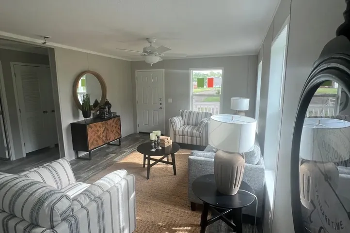 The JADE Living Room. This Manufactured Mobile Home features 2 bedrooms and 1 bath.