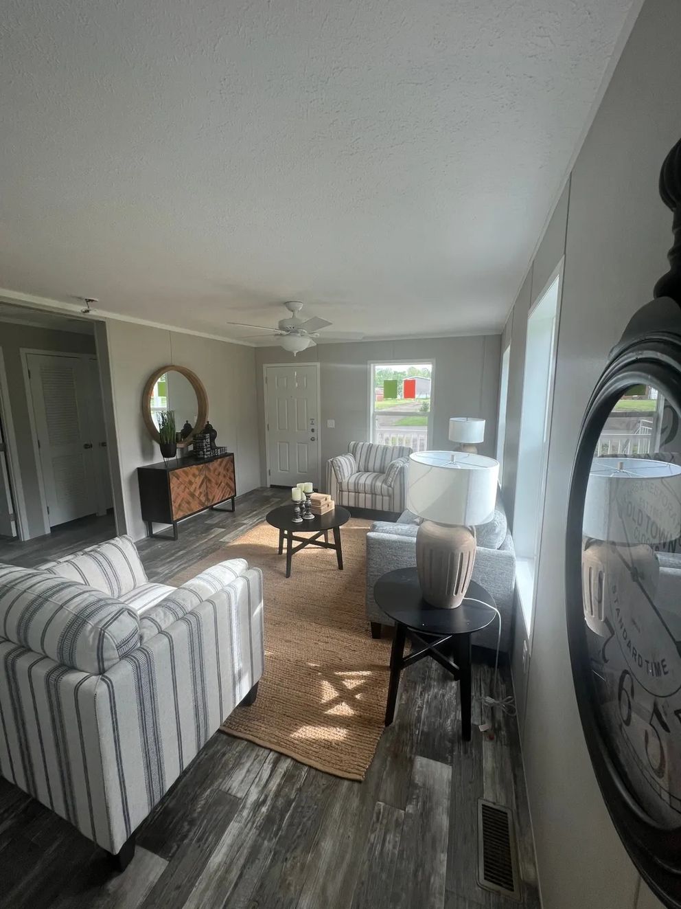 The JADE Living Room. This Manufactured Mobile Home features 2 bedrooms and 1 bath.