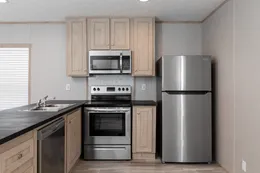 The BLAZER 48 A Kitchen. This Manufactured Mobile Home features 2 bedrooms and 1 bath.