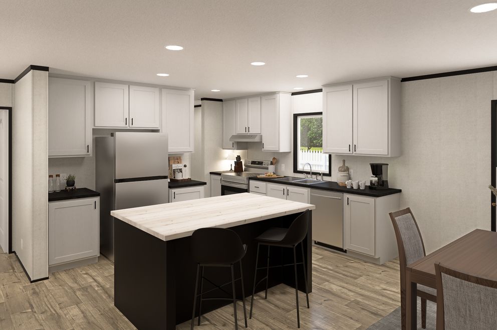 The THE MOUNTAINEER 48 Kitchen. This Manufactured Mobile Home features 3 bedrooms and 2 baths.