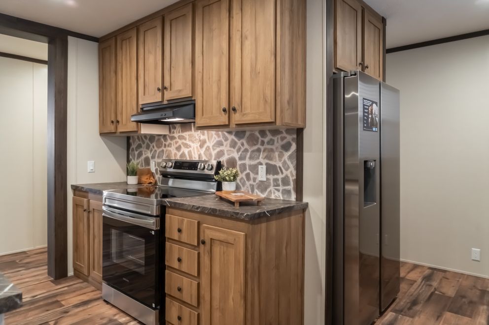The MOUNTAIN VIEW Kitchen. This Manufactured Mobile Home features 3 bedrooms and 2 baths.
