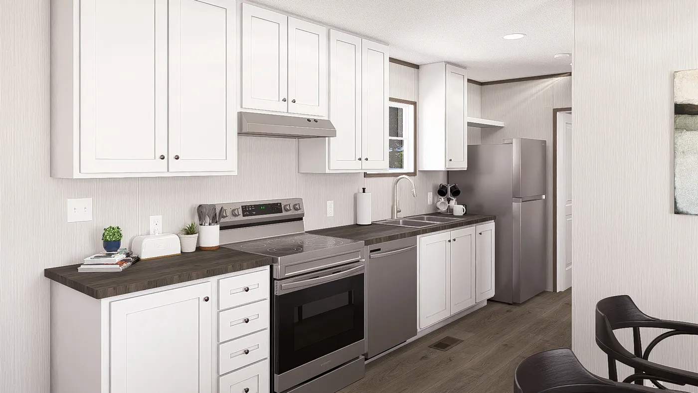 The LEGEND ANNIVERSARY 16X76 Kitchen. This Manufactured Mobile Home features 3 bedrooms and 2 baths.