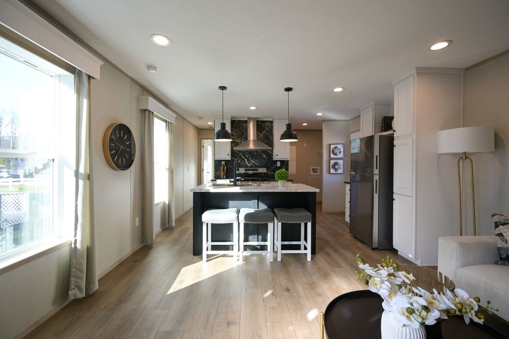 The TIGER'S EYE 7416-456 Living Room. This Manufactured Mobile Home features 3 bedrooms and 2 baths.