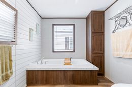 The THE SUNDOWNER Primary Bathroom. This Manufactured Mobile Home features 3 bedrooms and 2 baths.
