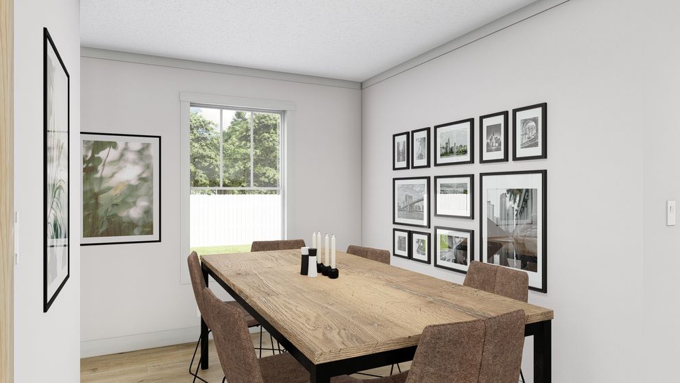 The BROWN EYED GIRL Dining Area. This Manufactured Mobile Home features 4 bedrooms and 2 baths.