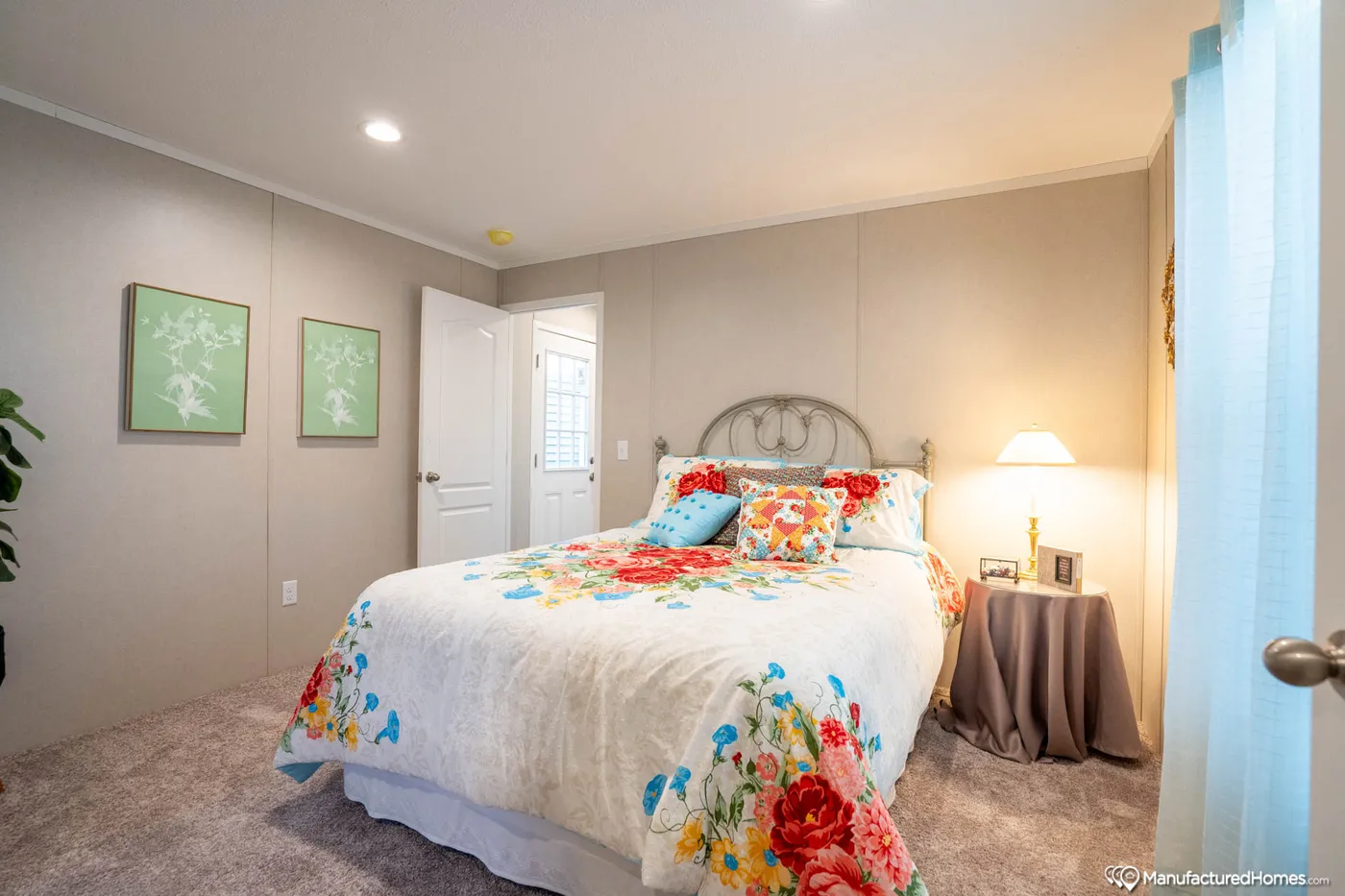 The TOPAZ 70 Primary Bedroom. This Manufactured Mobile Home features 3 bedrooms and 2 baths.