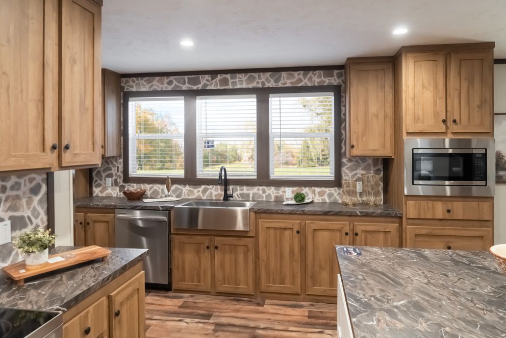 The MOUNTAIN VIEW Kitchen. This Manufactured Mobile Home features 3 bedrooms and 2 baths.
