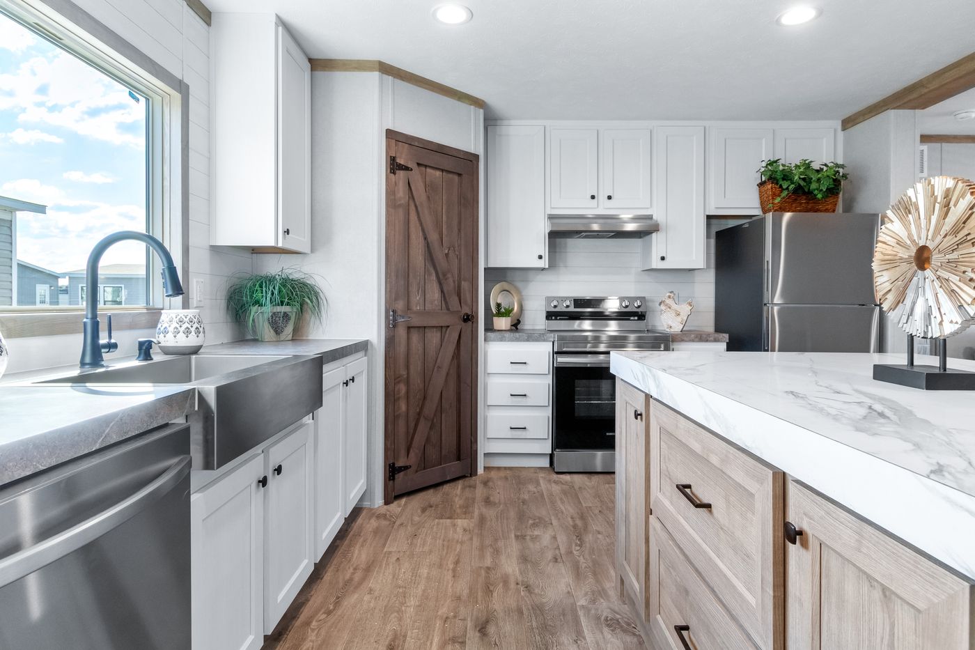 The PT 78 Kitchen. This Manufactured Mobile Home features 3 bedrooms and 2 baths.