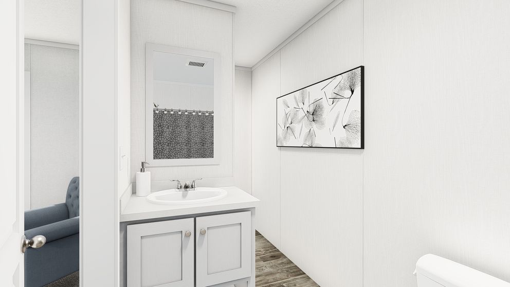 The PERIDOT 56 Primary Bathroom. This Manufactured Mobile Home features 2 bedrooms and 2 baths.