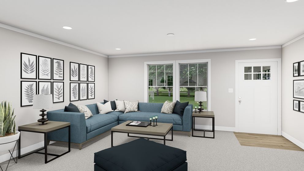 The LET IT BE Living Room. This Manufactured Mobile Home features 3 bedrooms and 2 baths.