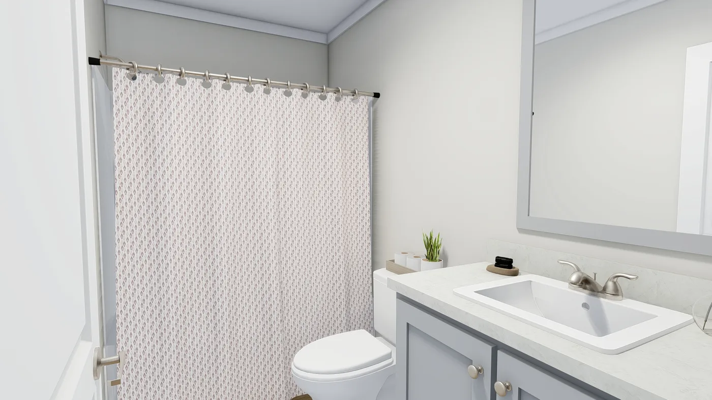 The SUNDANCE 48B Guest Bathroom. This Manufactured Mobile Home features 3 bedrooms and 2 baths.