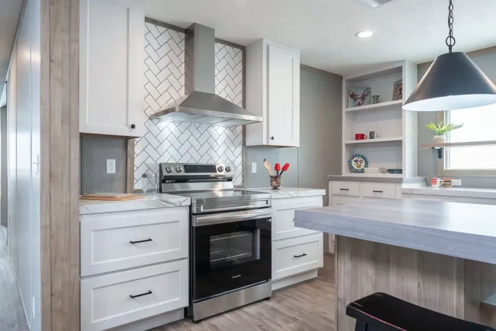 The BLUEBONNET BREEZE Kitchen. This Manufactured Mobile Home features 3 bedrooms and 2 baths.
