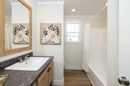 The HEY JUDE Guest Bathroom. This Manufactured Mobile Home features 5 bedrooms and 2 baths.